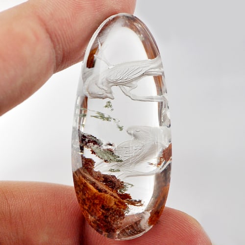 Natural Moss Quartz 75.00 Ct. Birds Carving Inner Pear Cabochon Shape 44 x 19 Mm. Gemstone: Product ID: 805527085 Product Name: Natural Quartz Weight: 75.00 CT. Size: 44 x 19 x 15 MM. Shape: Pear Cabochon Color: White Clarity:Semi - Transparent Luster: Good Gems Origin: Thailand Treatment: U
