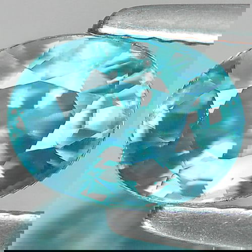 Natural Blue Zircon 1.60 Ct. VVS Oval Shape 7.2 x 5.3 Mm. Gemstone From Cambodia: Product ID: 807711015 Product Name: Natural Zircon Weight: 1.60 CT. Size: 7.2 x 5.3 x 4.1 MM. Shape: Oval Color: Blue Clarity:VVS Luster: Good Gems Origin: Cambodia Treatment: Heated Crystal Structure