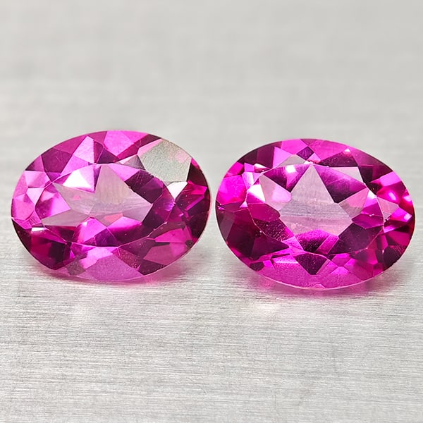 Natural Pink Topaz 2.93 Ct. 2 Pcs Clean Oval Shape 8 x 6 Mm Gemstone From Brazil: Product ID: 807168235 Product Name: Natural Topaz Weight: 2.93 CT. Size: 8 x 6 x 3.9 MM. Shape: Oval Shape Color: Pink Clarity:IF Luster: Very Good Gems Origin: Brazil Treatment: Treated Crystal Struc