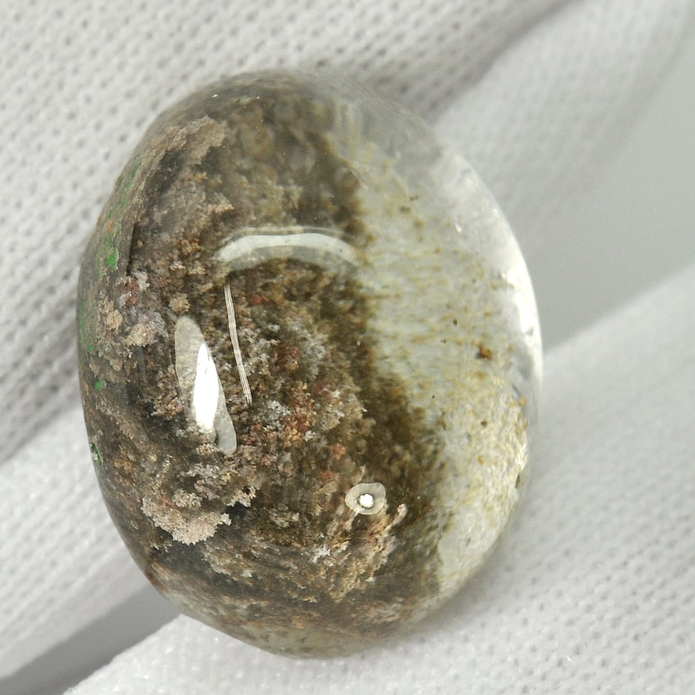 Natural Moss Quartz 13.51 Ct. Oval Cabochon Shape 17.1 x 13.5 Mm. Unheated Gemstone: Product ID: 805529483 Product Name: Natural Quartz Weight: 13.51 CT. Size: 17.1 x 13.5 x 8.7 MM. Shape: Oval Cabochon Color: White Clarity:Semi - Transparent Luster: Good Gems Origin: Thailand Treatme