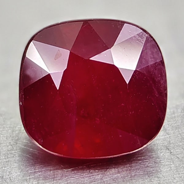 Natural Red Ruby 4.23 Ct. Cushion Shape 8.2 Mm Gemstone From Madagascar: Product ID: 805935077 Product Name: Natural Ruby Weight: 4.23 CT. Size: 8.2 x 8.8 x 5.7 MM. Shape: Cushion / Mixed Color: Red Clarity:VSI Luster: Good Gems Origin: Madagascar Treatment: Heated (Lead-g