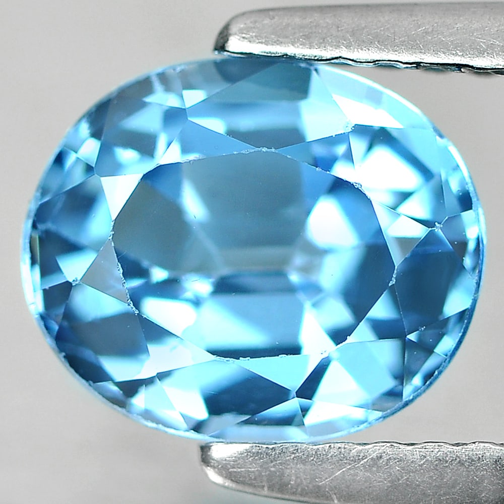 Natural Swiss Blue Topaz 2.00 Ct. Oval Shape 8.3 x 7 Mm Gemstone From Brazil: Product ID: 807167320 Product Name: Natural Blue Topaz Weight: 2.00 CT. Size: 8.3 x 7 x 4.5 MM. Shape: Oval Color: Blue Clarity:SI1 Luster: Good Gems Origin: Brazil Treatment: Treated Crystal Structur