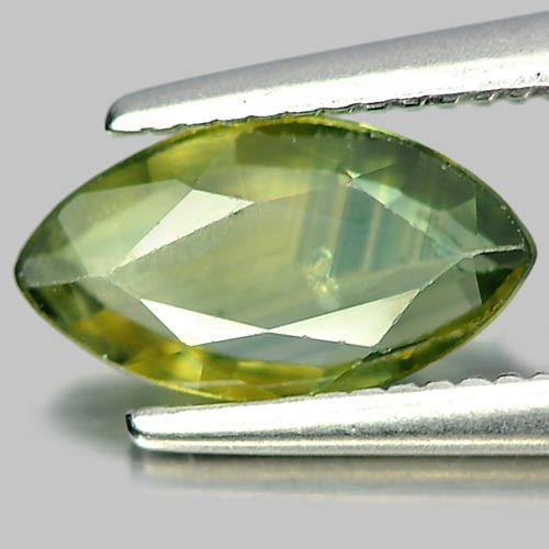 Natural Yellowish Green Sapphire 0.78 Ct. Marquise Shape 8.9 x 4.9 Mm. Gemstone From Thailand: Product ID: 806158899 Product Name: Natural Green Sapphire Weight: 0.78 CT. Size: 8.9 x 4.9 x 2 MM. Shape: Marquise Color: Yellowish Green Clarity:VSI Luster: Good Gems Origin: Thailand Treatment: Hea