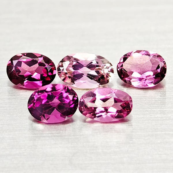 Natural Pink Tourmaline 0.92 Ct. 5 Pcs. Oval Shape Gemstones From Nigeria: Product ID: 807250953 Product Name: Natural Tourmaline Weight: 0.92 CT. Size: 4.8 x 3 x 2.1 to 4.2 x 3.1 x 1.9 MM. Shape: Oval Color: Pink Clarity:VSI Luster: Good Gems Origin: Nigeria Treatment: Unhe