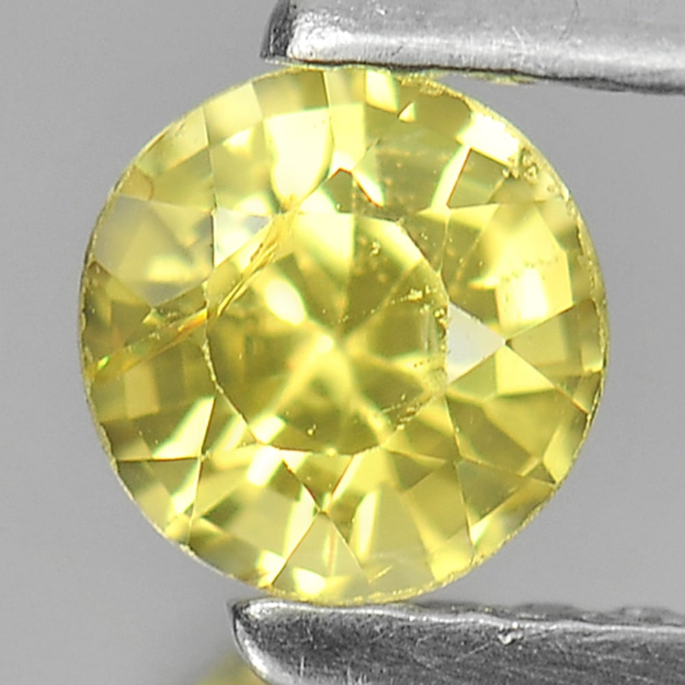 Natural Yellow Sapphire 0.55 Ct. Round Shape 4.8 Mm. Gemstone From Thailand: Product ID: 806160973 Product Name: Natural Yellow Sapphire Weight: 0.55 CT. Size: 4.8 x 4.8 x 3.4 MM. Shape: Round Color: Yellow Clarity:VSI Luster: Good Gems Origin: Thailand Treatment: Heated Cryst