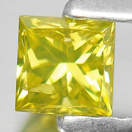 Natural Yellow Loose Diamond0.18 Ct. Square Princess Cut 2.3 Mm. From Belgium: Product ID: 802104175 Product Name: Natural Enhanced Diamond Weight: 0.18 CT. Size: 3 x 3 x 2.3 MM. Shape: Square Princess Cut Color: Yellow Clarity:SI1 Luster: Scintillating Gems Origin: Belgium Trea