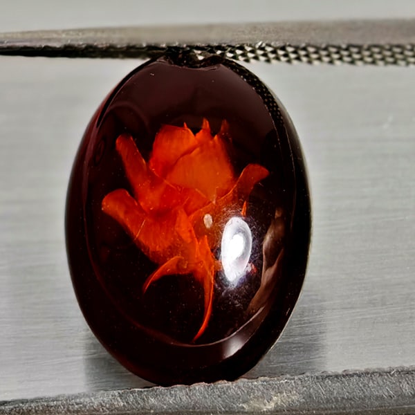 Natural Amber 1.48 Ct. Flower Carving In Oval Cabochon 14 x 10.2 Mm Gemstone From Poland: Product ID: 819091064 Product Name: Natural Amber Weight: 1.48 CT. Size: 14 x 10.2 x 4 MM. Shape: Oval Cabochon Color: Brown Yellow Clarity:Semi - Transparent Luster: Good Gems Origin: Poland Treatmen