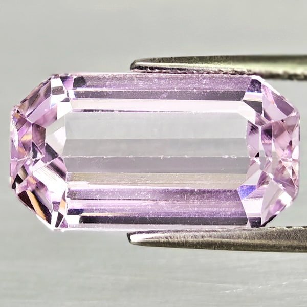 Natural Pink Kunzite 6.91 Ct. Octagon Shape 15 x 8.2 Mm Gemstone From Afghanistan: Product ID: 804103423 Product Name: Natural Kunzite Weight: 6.91 CT. Size: 15 x 8.2 x 6.2 MM. Shape: Octagon Shape Color: Light Pink Clarity:VSI Luster: Good Gems Origin: Afghanistan Treatment: Treate