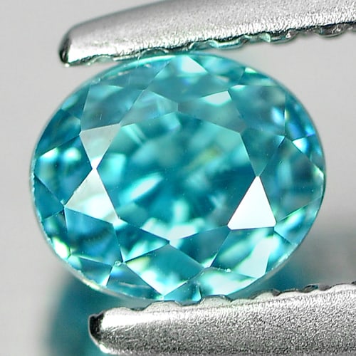 Natural Blue Zircon 0.97 Ct. Clean Oval Shape 5 x 4.3 Mm. Gemstone From Cambodia: Product ID: 807713060 Product Name: Natural Zircon Weight: 0.97 CT. Size: 5 x 4.3 x 4.3 MM. Shape: Oval Color: Blue Clarity:IF Luster: Good Gems Origin: Cambodia Treatment: Heated Crystal Structure: T