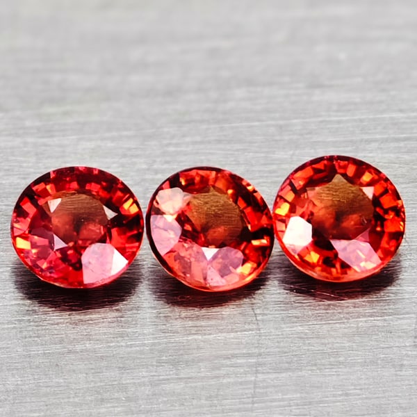 Natural Orangish Red Songea Sapphire 0.56 Ct. 3 Pcs Round Shape 3.3 Mm Gemstones From Tanzania: Product ID: 806162349 Product Name: Natural Red Sapphire Weight: 0.56 CT. Size: 3.3 x 3.3 x 2 MM. Shape: Round Color: Orange Red Clarity:VVS - VSI Luster: Good Gems Origin: Tanzania Treatment: Heated 