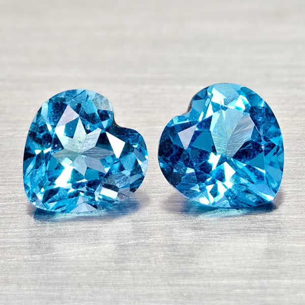 Natural Swiss Blue Topaz 2.11 Ct. 2 Pcs Heart Shape 6.2 x 6.1 Mm Gemstones From Brazil: Product ID: 807168027 Product Name: Natural Blue Topaz Weight: 2.11 CT. Size: 6.2 x 6.1 x 3.9 MM. Shape: Heart Shape Color: Swiss Blue Clarity:VSI - SI1 Luster: Good Gems Origin: Brazil Treatment: Tre