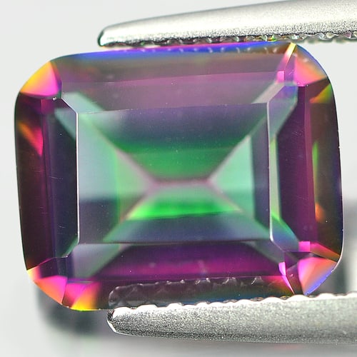 Natural Mystic Green Quartz 2.94 Ct. Clean Octagon Shape 10 x 8 Mm Gemstone From Brazil: Product ID: 805528375 Product Name: Natural Quartz Weight: 2.94 CT. Size: 10 x 8 x 5 MM. Shape: Octagon Color: Mystic Clarity:IF Luster: Good Gems Origin: Brazil Treatment: Treated Crystal Structure: 