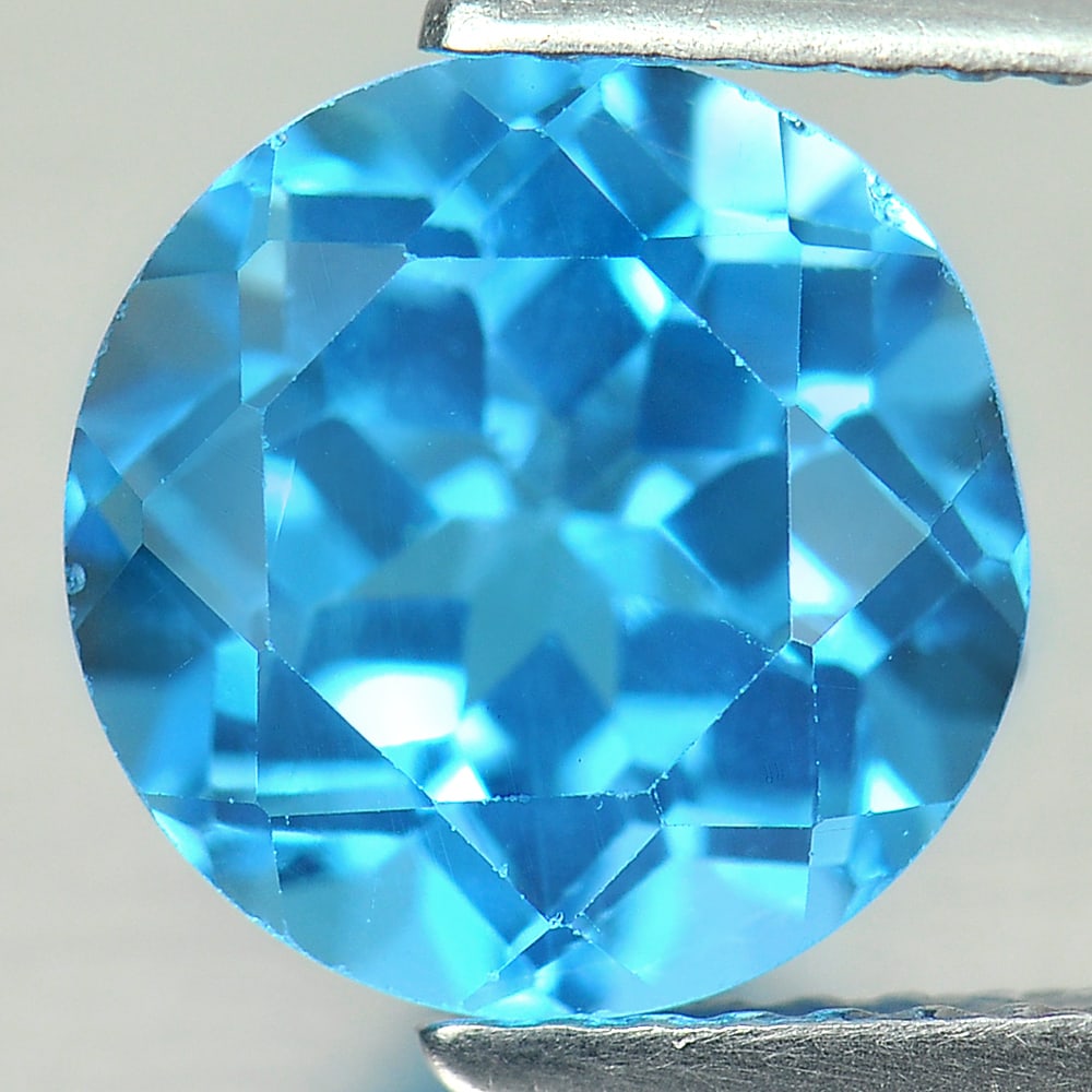 Natural Swiss Blue Topaz 3.32 Ct. VVS Round Shape 8.9 Mm. Gemstone From Brazil: Product ID: 807156381 Product Name: Natural Blue Topaz Weight: 3.32 CT. Size: 8.9 x 8.9 x 6 MM. Shape: Round Color: Swiss Blue Clarity:VVS Luster: Good Gems Origin: Brazil Treatment: Treated Crystal S