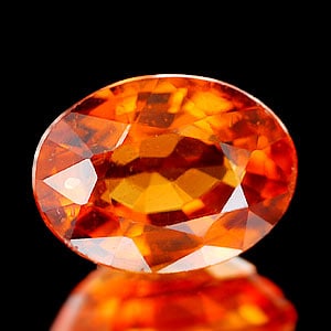 Natural Reddish Orange Spessartine Garnet 0.86 Ct. Oval Shape 6.6 x 5 Mm Gemstone From Nigeria: Product ID: 802921021 Product Name: Natural Spessartine Weight: 0.86 CT. Size: 6.6 x 5 x 3.4 MM. Shape: Oval Color: Reddish Orange Clarity:SI Luster: Good Gems Origin: Nigeria Treatment: Unheated Crys