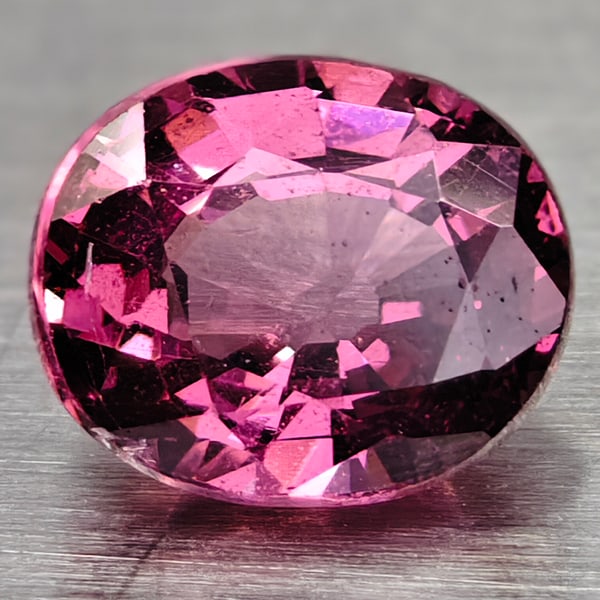 Natural Purple Pink Rhodolite Garnet 0.79 Ct. Oval Shape 5.7 x 4.7 Mm Gemstone From Madagascar: Product ID: 102906885 Product Name: Natural Rhodolite Weight: 0.79 CT. Size: 5.7 X 4.7 X 3.2 MM. Shape: Oval Color: Purple Pink Clarity:IF Luster: Good Gems Origin: Madagascar Treatment: Unheated Crys