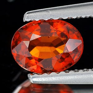 Natural Reddish Orange Spessartine Garnet 0.96 Ct. Oval Shape 6.8 x 5 Mm Gemstone From Nigeria: Product ID: 802921449 Product Name: Natural Spessartine Weight: 0.96 CT. Size: 6.8 x 5 x 3.5 MM. Shape: Oval Color: Reddish Orange Clarity:SI Luster: Good Gems Origin: Nigeria Treatment: Unheated Crys