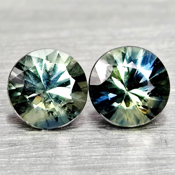 Natural Fancy Color Sapphire 0.45 Ct. 2 Pcs Round Diamand Cut 3.6 Mm Gemstones From Tanzania: Product ID: 806162220 Product Name: Natural Green Sapphire Weight: 0.45 CT. Size: 3.6 x 3.6 x 2.4 MM. Shape: Round Diamond Cut Color: Fancy Color Clarity:VSI Luster: Very Good Gems Origin: Tanzania Tr