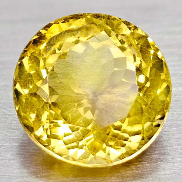 Natural Yellow Citrine 6.38 Ct. Round Shape 11.9 Mm Gemstone From Brazil: Product ID: 801815111 Product Name: Natural Citrine Weight: 6.38 CT. Size: 11.9 x 11.9 x 8 MM. Shape: Round Color: Yellow Clarity:VSI Luster: Good Gems Origin: Brazil Treatment: Unheated Crystal Struc