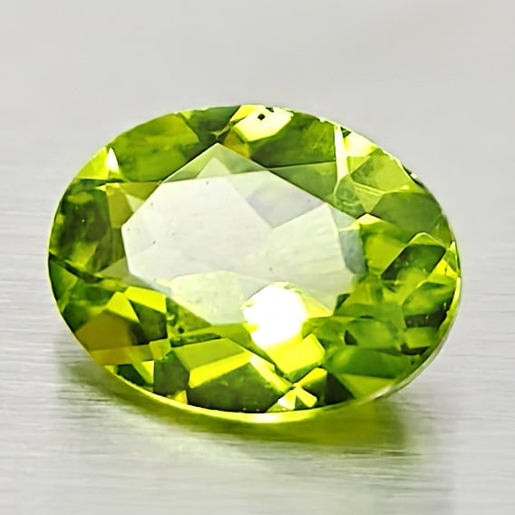 Natural Green Peridot 1.17 Ct. Oval Shape 8 x 5.9 Mm. Gemstone From Pakistan: Product ID: 805316981 Product Name: Natural Peridot Weight: 1.17 CT. Size: 8 x 6 x 3.5 MM. Shape: Oval Color: Green Clarity:VSI Luster: Good Gems Origin: Pakistan Treatment: Unheated Crystal Structure