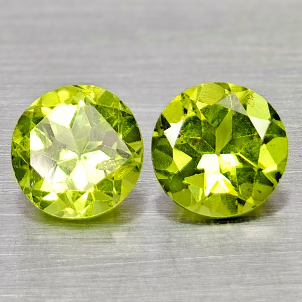 Natural Green Peridot 1.76 Ct. 2 Pcs. Round Shape 6 Mm. Gemstone From Pakistan: Product ID: 805317116 Product Name: Natural Peridot Weight: 1.76 CT. Size: 6 x 6 x 4 MM. Shape: Round Color: Green Clarity:VSI - SI1 Luster: Good Gems Origin: Pakistan Treatment: Unheated Crystal Stru