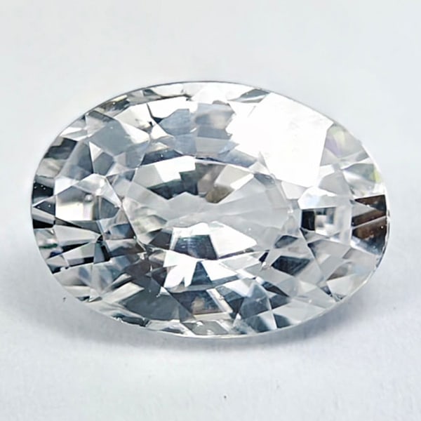 Natural White Zircon 1.22 Ct. Oval Shape 7.2 x 5.1 Mm. Gemstone From Brazil: Product ID: 807742856 Product Name: Natural Zircon Weight: 1.22 CT. Size: 7.2 x 5.1 x 3.5 MM. Shape: Oval Color: White Clarity:VSI Luster: Good Gems Origin: Cambodia Treatment: Heated Crystal Structur