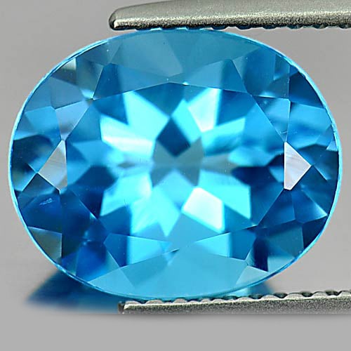 Natural Swiss Blue Topaz 4.63 Ct. VVS Oval Shape 11 x 9 Mm. Gemstone From Brazil: Product ID: 807160583 Product Name: Natural Blue Topaz Weight: 4.63 CT. Size: 11 x 9 x 6.4 MM. Shape: Oval Color: Swiss Blue Clarity:VVS Luster: Good Gems Origin: Brazil Treatment: Treated Crystal Str
