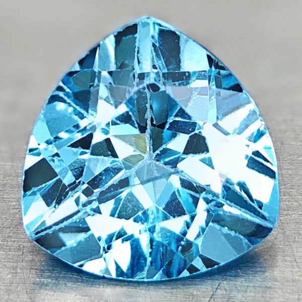 Natural Swiss Blue Topaz 3.97 Ct. Trilliant Shape 10 Mm Gemstone From Brazil: Product ID: 807167865 Product Name: Natural Blue Topaz Weight: 3.97 CT. Size: 10 x 10 x 6.2 MM. Shape: Trilliant Color: Swiss Blue Clarity:VSI Luster: Good Gems Origin: Brazil Treatment: Treated Cryst