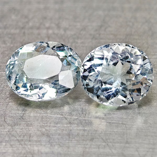 Natural Blue Aquamarine 1.72 Ct. 2 Pcs Oval Shape 6.9 x 5.8 Mm Gemstones From Brazil: Product ID: 800812002 Product Name: Natural Aquamarine Weight: 1.72 CT. Size: 6.9 x 5.8 x 3.6 MM. Shape: Oval Color: Light Blue Clarity:VSI Luster: Good Gems Origin: Brazil Treatment: Unheated Crystal