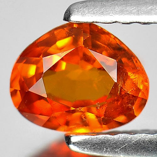 Natural Orange Spessartine Garnet 0.73 Ct. Pear Shape 6 x 5 Mm. Gemstone Unheated From Namibia: Product ID: 802934638 Product Name: Natural Spessartine Weight: 0.73 CT. Size: 6 x 5 x 2.8 MM. Shape: Pear Color: Orange Clarity:VSI Luster: Good Gems Origin: Namibia Treatment: Unheated Crystal Struc