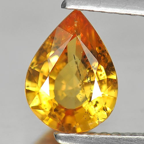 Natural Orangish Yellow Songea Sapphire 1.63 Ct. Pear Shape 8.9 x 6.7 Mm. Gemstone From Tanzania: Product ID: 806135161 Product Name: Natural Yellow Sapphire Weight: 1.63 CT. Size: 8.9 x 6.7 x 3.8 MM. Shape: Pear Color: Orangish Yellow Clarity:SI Luster: Good Gems Origin: Tanzania Treatment: Heate