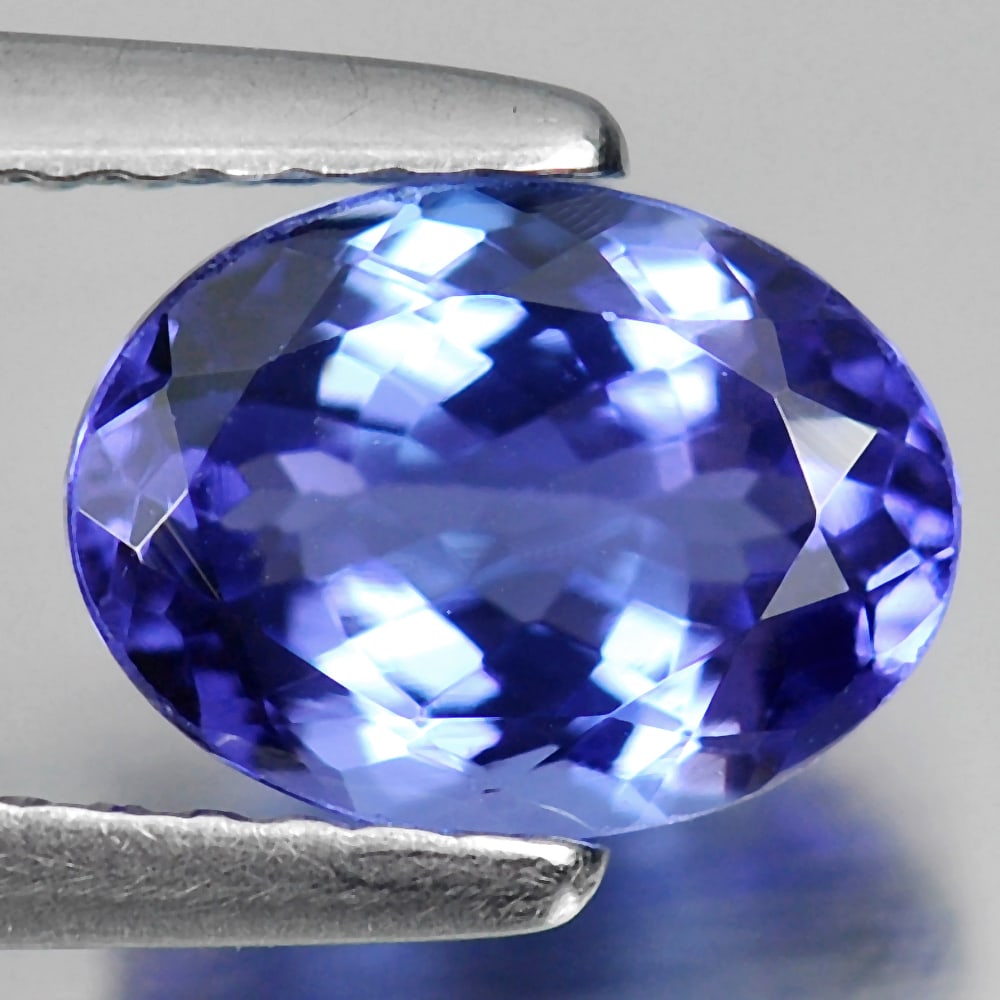 Natural Violetish Blue Tanzanite 1.43 Ct. VVS Oval Shape 8 x 6 x 3.8 Mm. Gemstone From Tanzania: Product ID: 807009041 Product Name: Natural Tanzanite Weight: 1.43 CT. Size: 8 x 6 x 3.8 MM. Shape: Oval Color: Violetish Blue Clarity:VVS Luster: Good Gems Origin: Tanzania Treatment: Heated Crystal