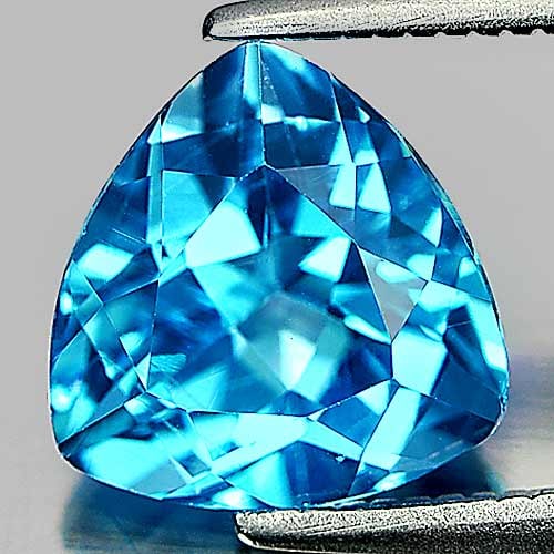 Natural Swiss Blue Topaz 2.62 Ct. VVS Trilliant Shape 8.7 Mm Gemstone From Brazil: Product ID: 807154688 Product Name: Natural Blue Topaz Weight: 2.62 CT. Size: 8.7 x 8.6 x 5.4 MM. Shape: Trilliant Color: Blue Clarity:VVS Luster: Good Gems Origin: Brazil Treatment: Treated Crystal S