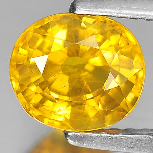 Natural Yellow Sapphire 1.92 Ct. Oval Shape 7.4 x 6.5 Mm. Gemstone From Thailand: Product ID: 806151567 Product Name: Natural Yellow Sapphire Weight: 1.92 CT. Size: 7.4 x 6.5 x 4.7 MM. Shape: Oval Color: Yellow Clarity:VSI Luster: Very Good Gems Origin: Thailand Treatment: Heated C