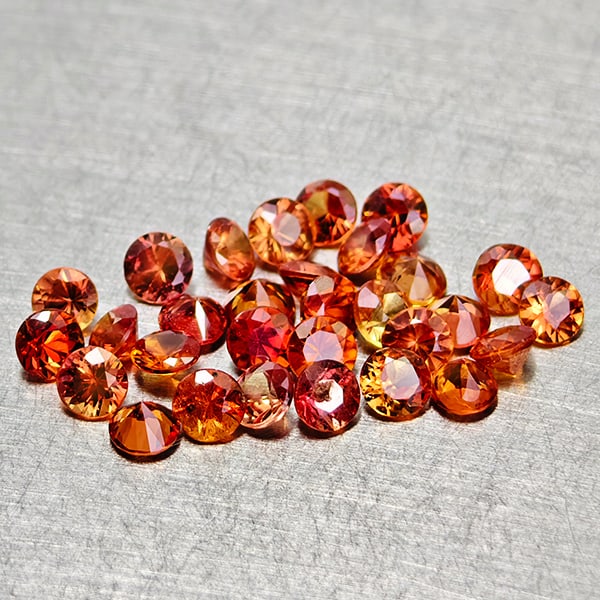 Natural Orange Red Songea Sapphire 2.39 Ct. 30 Pcs Round Diamond Cut 2.5 Mm Gemstones From Tanzania: Product ID: 806162048 Product Name: Natural Red Sapphire Weight: 2.39 CT. Size: 2.5 x 2.5 x 1.7 MM. Shape: Round Diamond Cut Color: Red Orange Clarity:VSI Luster: Good Gems Origin: Tanzania Treatment: