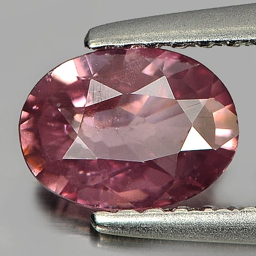 Natural Imperial Pink Zircon 0.92 Ct. Oval Shape 6.9 x 5.1 Mm. Unheated Gemstone From Tanzania: Product ID: 807719624 Product Name: Natural Zircon Weight: 0.92 CT. Size: 6.9 x 5.1 x 2.6 MM. Shape: Oval Color: Imperial Pink Clarity:VSI Luster: Good Gems Origin: Tanzania Treatment: Unheated Crysta