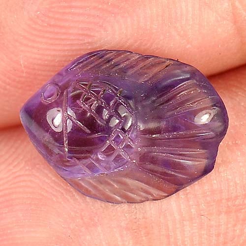 Natural Violet Amethyst 3.27 Ct. Fish Carving Size 13.7 x 10 Mm Gemstone From Brazil: Product ID: 810303663 Product Name: Natural Amethyst Weight: 3.27 CT. Size: 13.7 x 10 x 4.7 MM. Shape: Fish Carving Color: Violet Clarity:Semi - Transparent Luster: Good Gems Origin: Brazil Treatment: