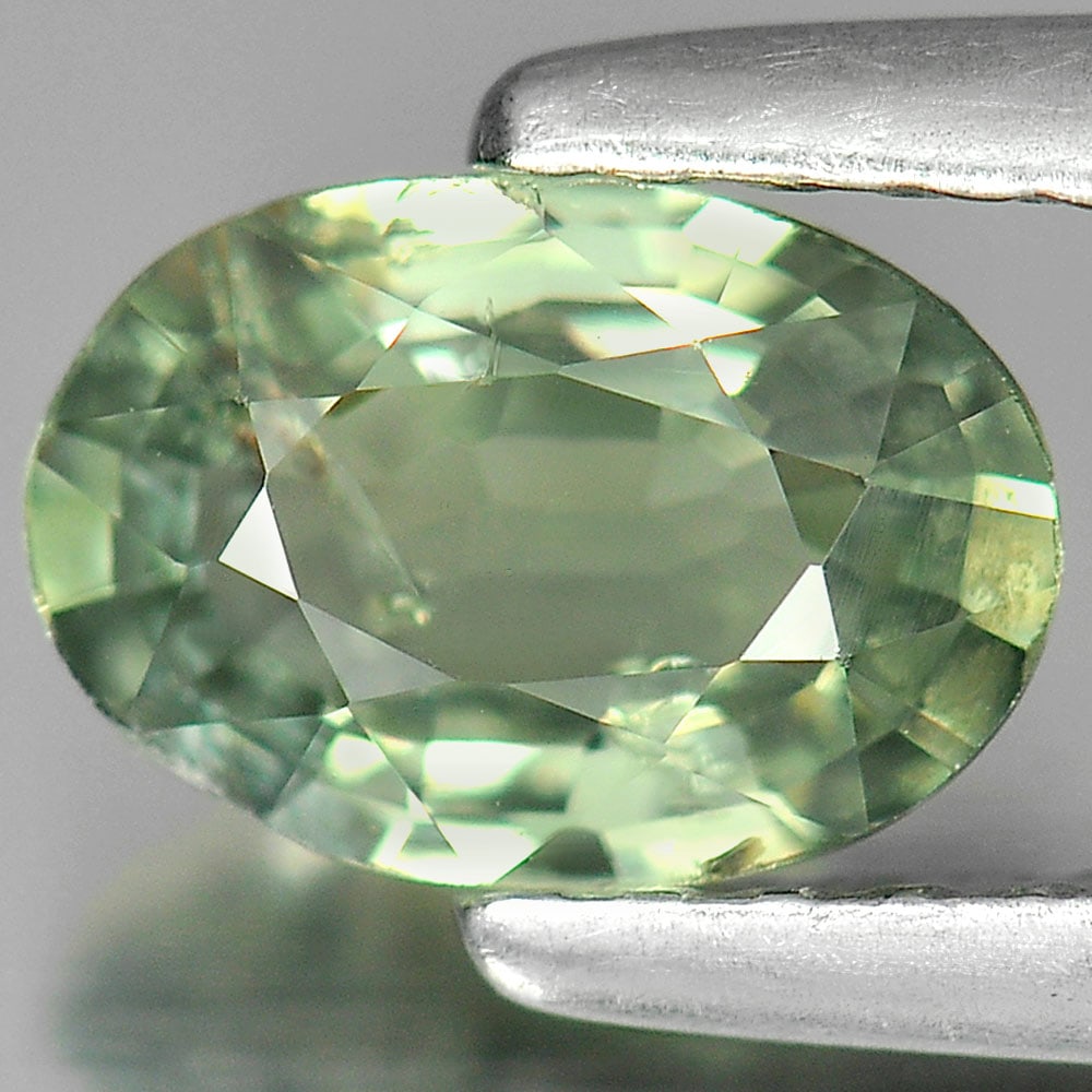 Natural Green Songea Sapphire 0.85 Ct. Oval Shape 7 x 4.8 Mm. Gemstone From Tanzania: Product ID: 806135236 Product Name: Natural Green Sapphire Weight: 0.85 CT. Size: 7 x 4.8 x 2.7 MM. Shape: Oval Color: Green Clarity:SI Luster: Good Gems Origin: Tanzania Treatment: Heated Crystal Str