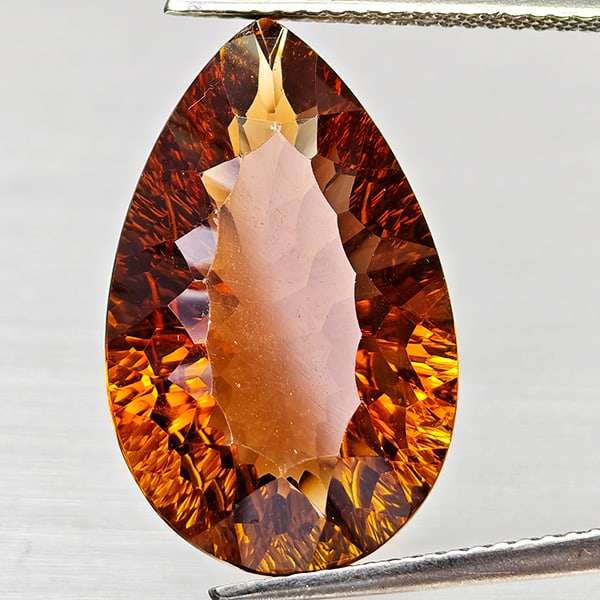 Natural Imperial Topaz 12.96 Ct. Pear Concave Cut 20 x 12.7 Mm. Unheated Gemstone From Brazil: Product ID: 807168294 Product Name: Natural Topaz Weight: 12.96 CT. Size: 20 x 12.7 x 7.1 MM. Shape: Oval Concave Color: Imperial Clarity:VSI Luster: Good Gems Origin: Brazil Treatment: Unheated Cryst