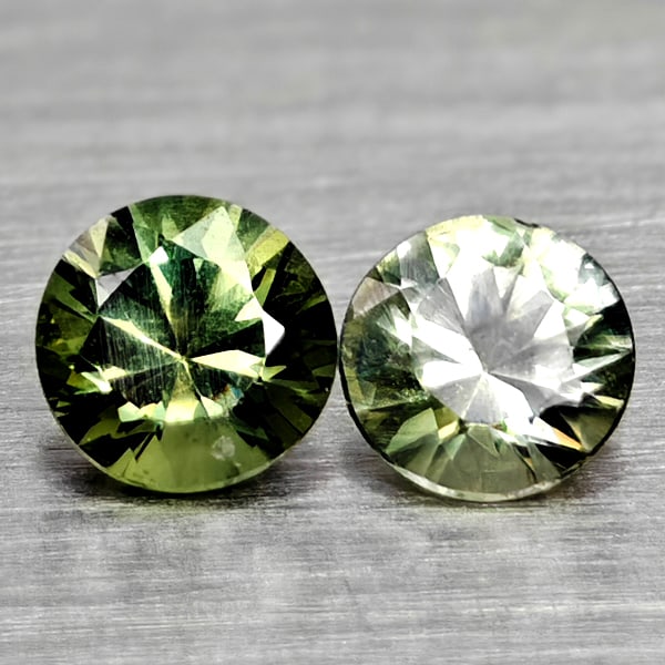 Natural Fancy Color Sapphire 0.49 Ct. 2 Pcs Round Diamand Cut 3.8 Mm Gemstones From Tanzania: Product ID: 806162213 Product Name: Natural Green Sapphire Weight: 0.49 CT. Size: 3.8 x 3.8 x 2.7 MM. Shape: Round Diamond Cut Color: Fancy Color Clarity:VSI Luster: Very Good Gems Origin: Tanzania Tr