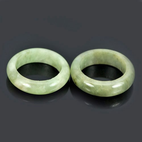 Natural Green Rings Jade Size 5 Round Shape 26.57 Ct. 2 Pcs. Gemstone: Product ID: 819809474 Product Name: Natural Jade Weight: 26.57 CT. Size: 21 x 21 MM. Shape: Round Color: White Green Clarity:Opaque Luster: Good Gems Origin: Thailand Treatment: Unheated Crystal Struc