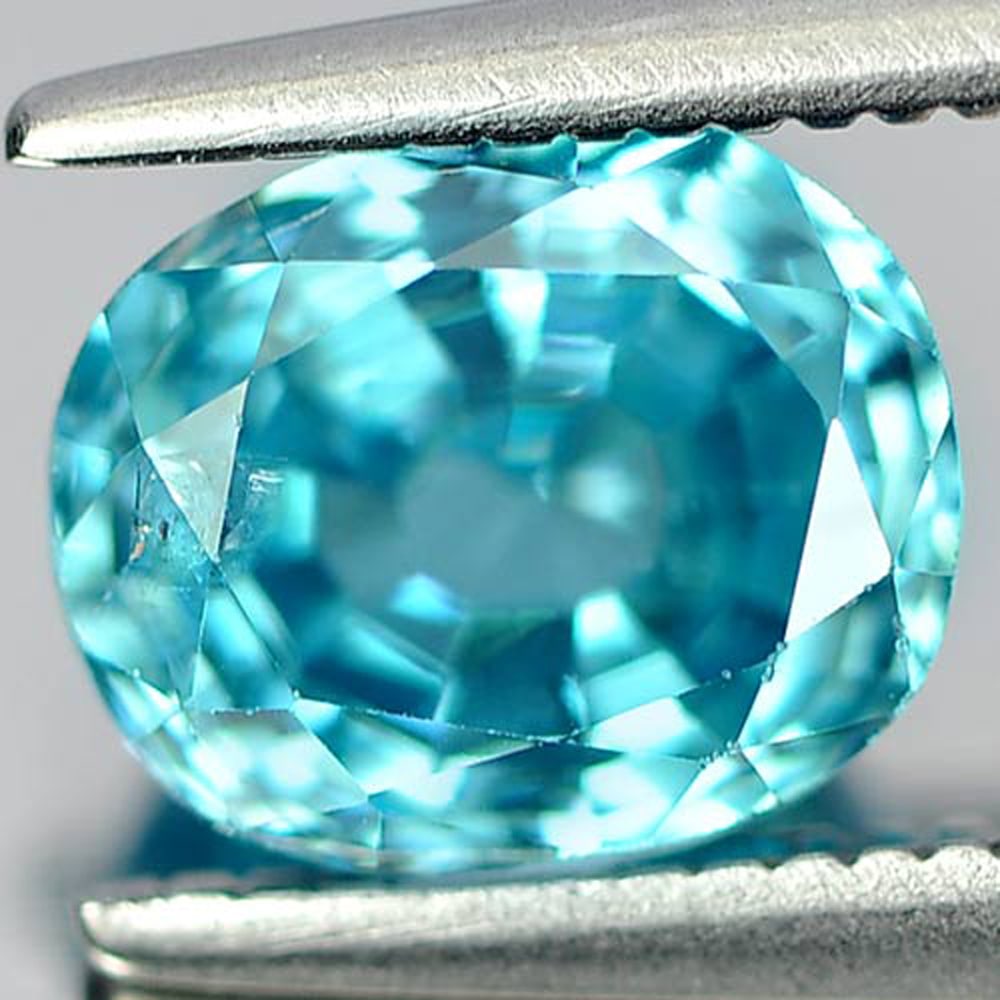 Natural Blue Zircon 2.19 Ct. Oval Shape 7.3 x 6 Mm. Gemstone From Cambodia: Product ID: 807730326 Product Name: Natural Zircon Weight: 2.19 CT. Size: 7.3 x 6 x 4.6 MM. Shape: Oval Color: Blue Clarity:SI1 Luster: Good Gems Origin: Cambodia Treatment: Heated Crystal Structure: