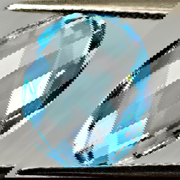 Natural Swiss Blue Topaz 3.95 Ct. Oval Double Checkerboard Cut 12.1 x 10.1 Mm Gemstone From Brazil: Product ID: 807167913 Product Name: Natural Blue Topaz Weight: 3.95 CT. Size: 12.1 x 10.1 x 4.2 MM. Shape: Oval Bouble Checkerboard Color: Swiss Blue Clarity:VSI Luster: Good Gems Origin: Brazil Treat