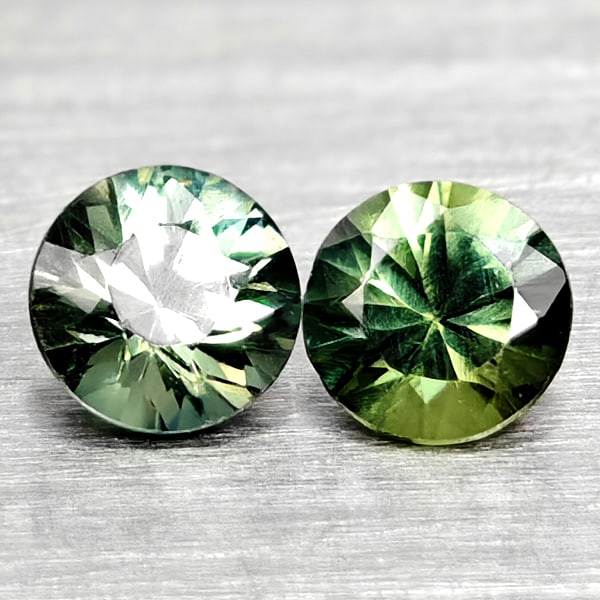 Natural Fancy Color Sapphire 0.38 Ct. 2 Pcs Round Diamand Cut 3.4 Mm Gemstones From Tanzania: Product ID: 806162231 Product Name: Natural Green Sapphire Weight: 0.38 CT. Size: 3.4 x 3.4 x 2.5 MM. Shape: Round Diamond Cut Color: Fancy Color Clarity:VSI Luster: Very Good Gems Origin: Tanzania Tr