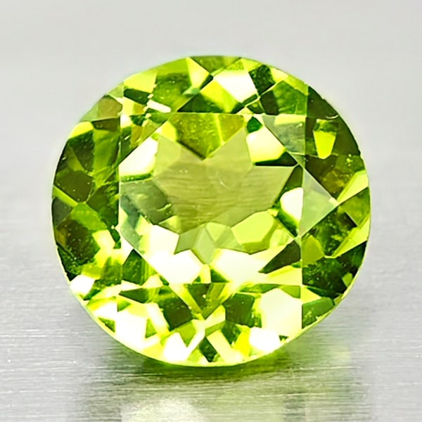 Natural Green Peridot 1.87 Ct. Round Shape 8 Mm Gemstone From Thailand: Product ID: 805316902 Product Name: Natural Peridot Weight: 1.87 CT. Size: 8 x 8 x 4.7 MM. Shape: Round Color: Green Clarity:VSI Luster: Good Gems Origin: Thailand Treatment: Unheated Crystal Structur