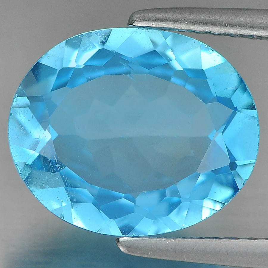 Natural Swiss Blue Topaz 4.64 Ct. Oval Shape 12 x 10 Mm. Gemstone From Brazil: Product ID: 807161169 Product Name: Natural Blue Topaz Weight: 4.64 CT. Size: 12 x 10 x 9 MM. Shape: Oval Color: Blue Clarity:SI Luster: Good Gems Origin: Brazil Treatment: Treated Crystal Structure: