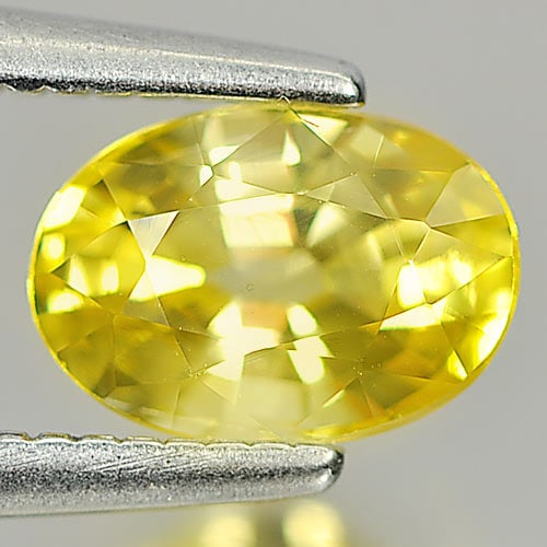 Natural Yellow Ceylon Sapphie 1.06 Ct. Oval Shape 6.9 x 4.8 Mm. Gemstone From Sri - Lanka: Product ID: 806156412 Product Name: Natural Yellow Sapphire Weight: 1.06 CT. Size: 6.9 x 4.8 x 3.8 MM. Shape: Oval Color: Yellow Clarity:VSI Luster: Good Gems Origin: Ceylon, Sri - Lanka Treatment: He