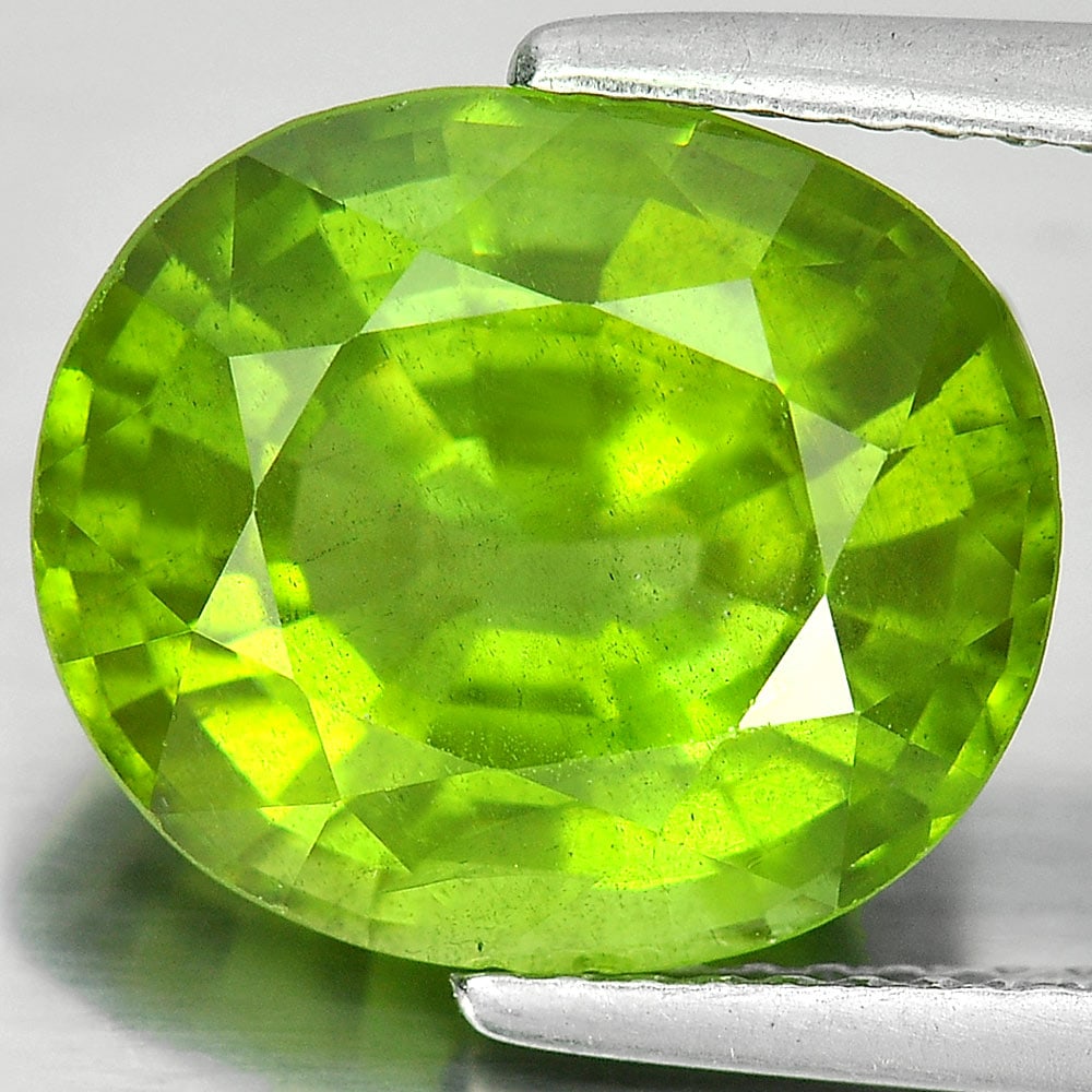Natural Green Peridot 5.55 Ct. Oval Shape 12.1 x 10.4 Mm. Unheated Gemstone From Thailand: Product ID: 805307431 Product Name: Natural Peridot Weight: 5.55 CT. Size: 12.1 x 10.4 x 6.6 MM. Shape: Oval Color: Green Clarity:SI1 Luster: Good Gems Origin: Thailand Treatment: Unheated Crystal Str