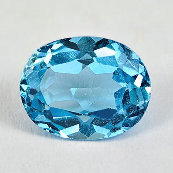 Natural Swiss Blue Topaz 2.42 Ct. Oval Shape 9 x 7 Mm. Gemstone From Brazil: Product ID: 807167813 Product Name: Natural Blue Topaz Weight: 2.42 CT. Size: 9 x 7 x 4.6 MM. Shape: Oval Color: Blue Clarity:VSI Luster: Good Gems Origin: Brazil Treatment: Treated Crystal Structure: