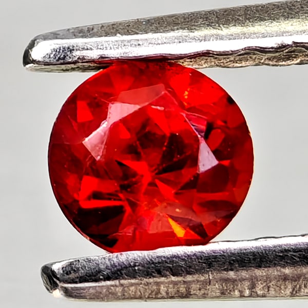 Natural Red Sapphire 0.28 Ct. Round Diamond Cut 3.7 Mm. Gemstones From Tanzania: Product ID: 806162471 Product Name: Natural Red Sapphire Weight: 0.28 CT. Size: 3.7 x 3.7 x 2.7 MM. Shape: Round Diamond Cut Color: Orangish Red Clarity:VSI Luster: Good Gems Origin: Tanzania Treatmen