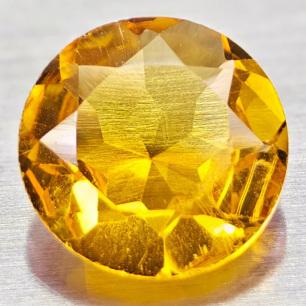 Natural Yellow Citrine 1.05 Ct. Round Shape 7 Mm. Gemstone From Brazil: Product ID: 801813575 Product Name: Natural Citrine Weight: 1.05 CT. Size: 7 x 7 x 3.8 MM. Shape: Round Color: yellow Clarity:VVS Luster: Good Gems Origin: Brazil Treatment: Unheated Crystal Structure
